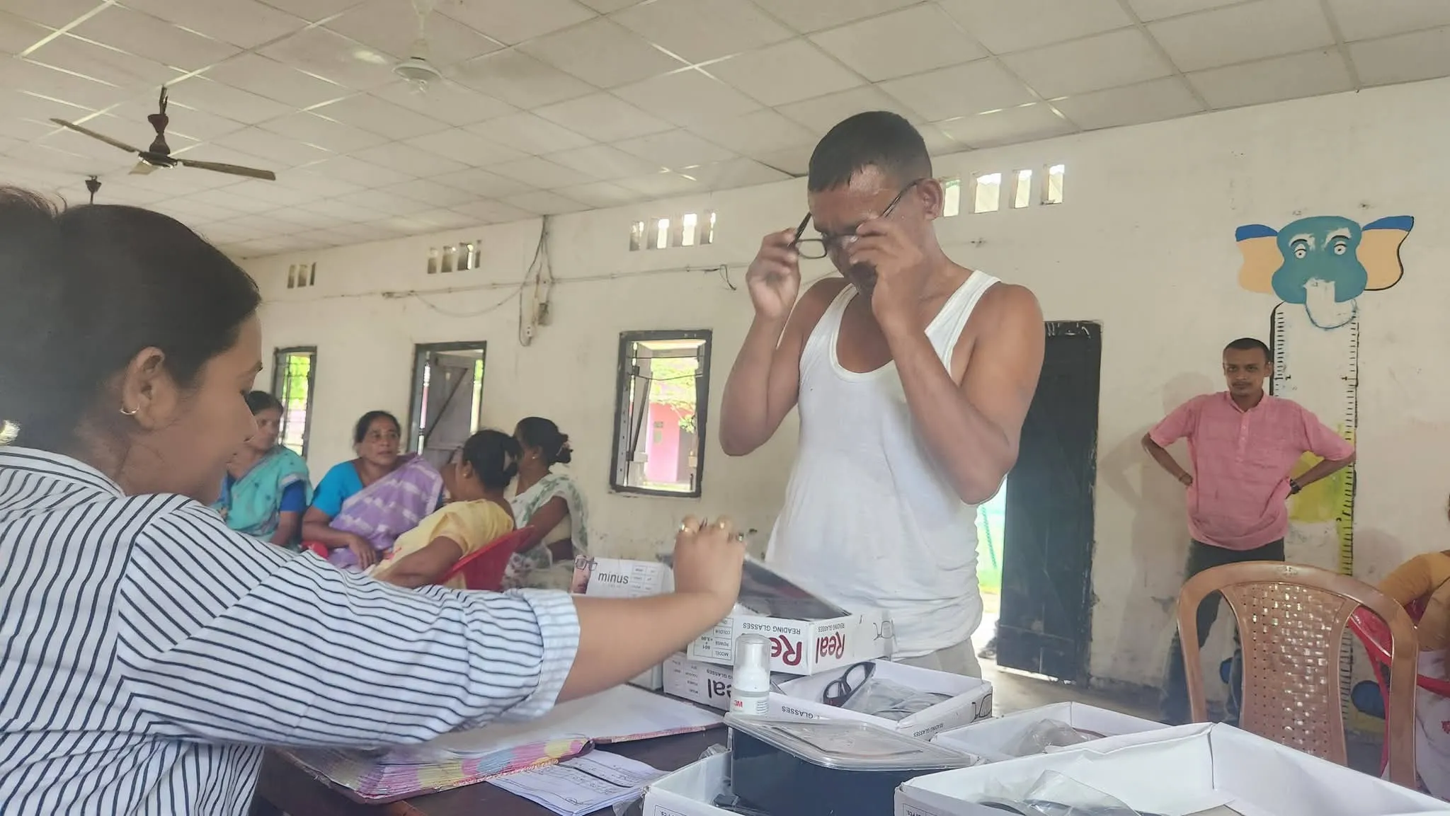 Medical team checking ocular signs for senior patients.